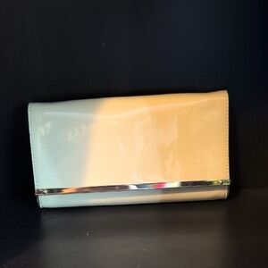 Elegant Cream Clutch with Gold Accent